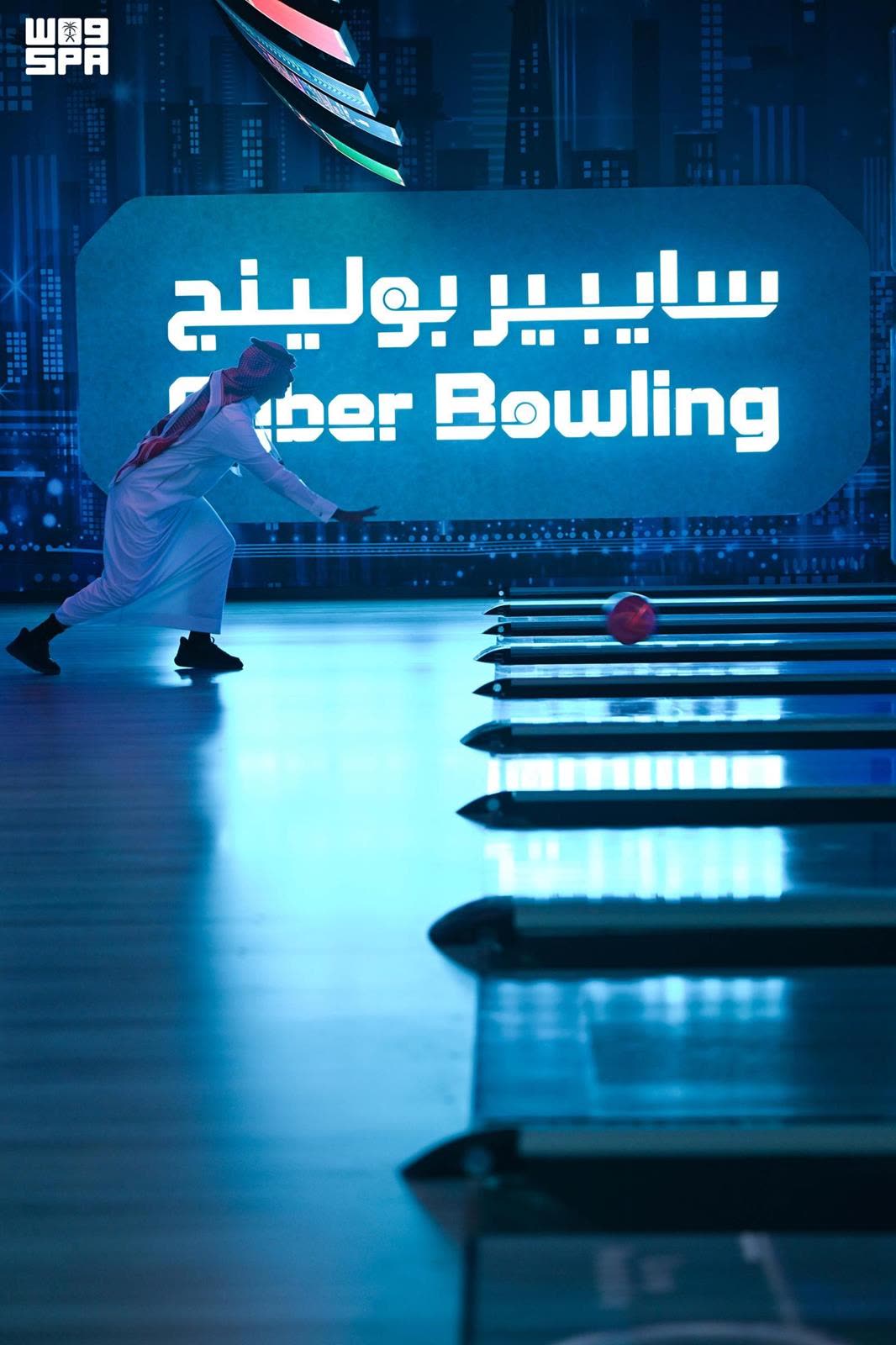 The lanes and screen wall at Cyber Bowling