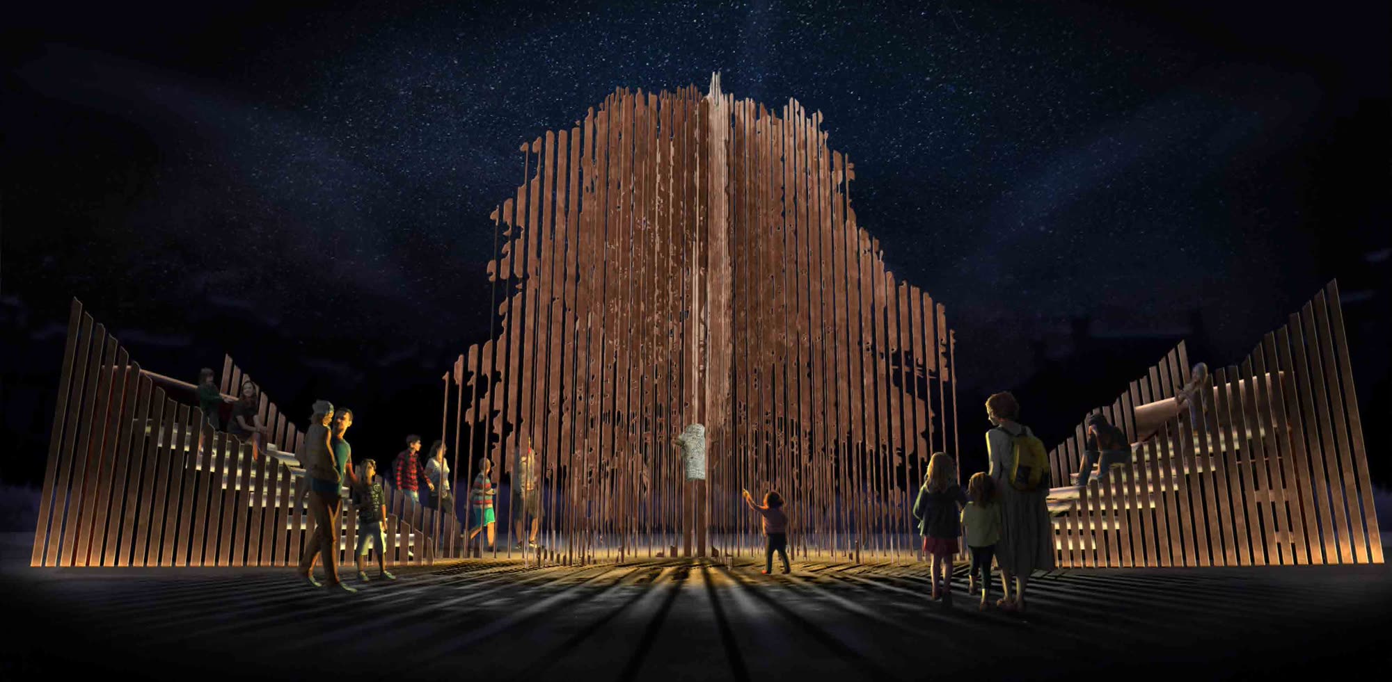 The sculpture lit at night, visitors walking between the steel columns